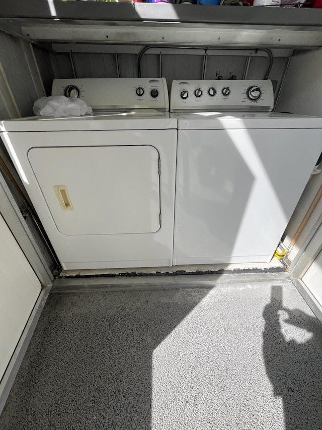 laundry room with laundry area and separate washer and dryer