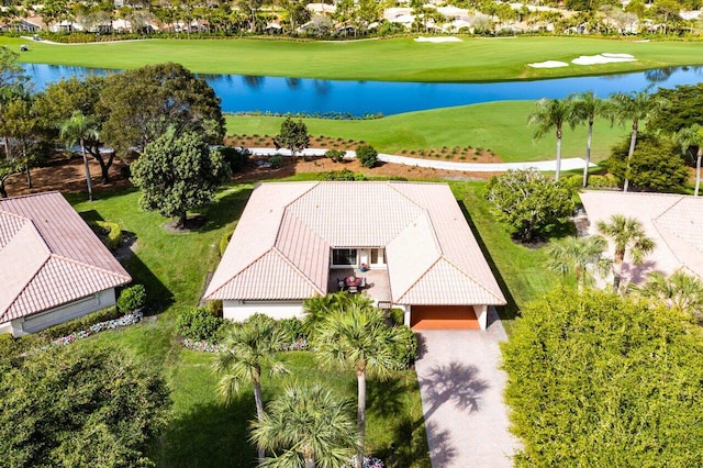 aerial view featuring a water view and golf course view