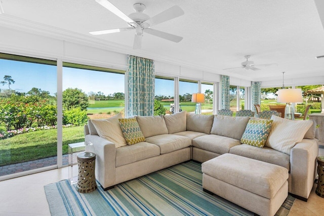 sunroom / solarium with ceiling fan