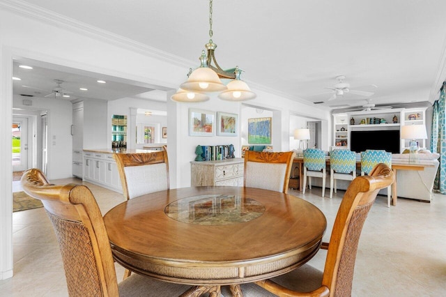 dining room with ornamental molding, recessed lighting, built in shelves, and a ceiling fan