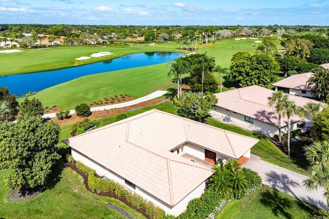 bird's eye view with view of golf course and a water view