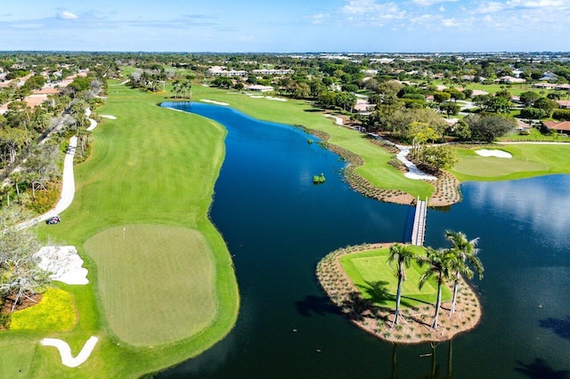 aerial view featuring a water view and golf course view