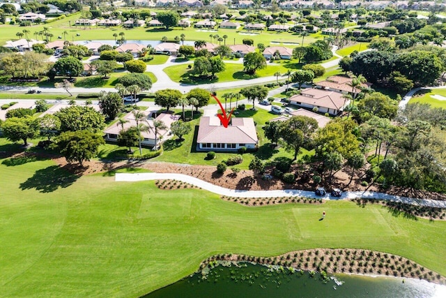 bird's eye view with view of golf course and a residential view