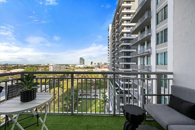 balcony featuring a city view