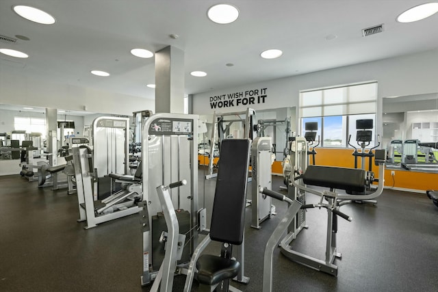 exercise room featuring plenty of natural light and visible vents