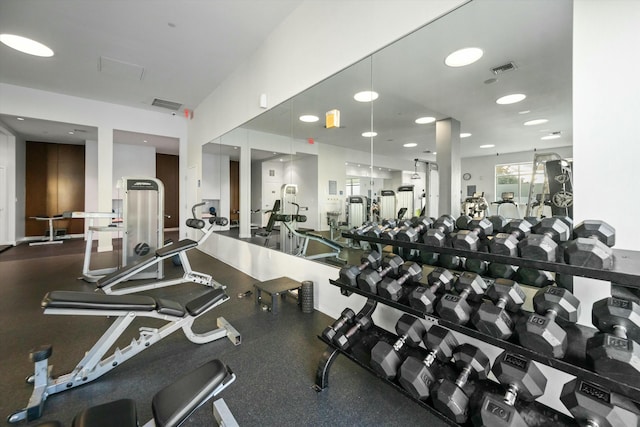 exercise room featuring visible vents