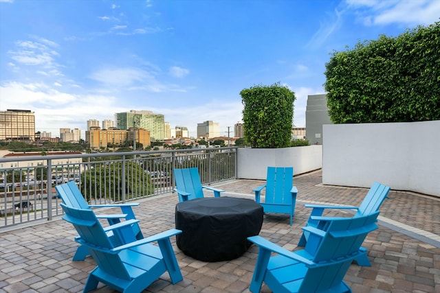 view of patio featuring a view of city and grilling area