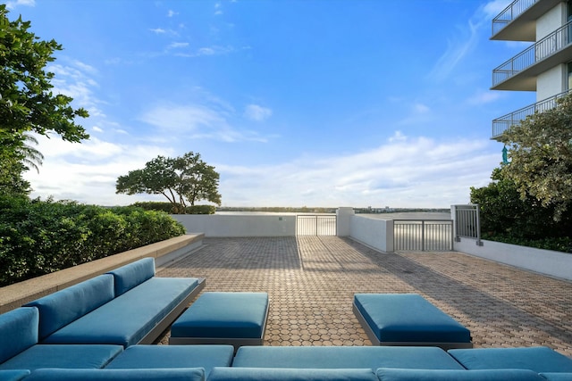 view of patio / terrace with a gate and an outdoor living space