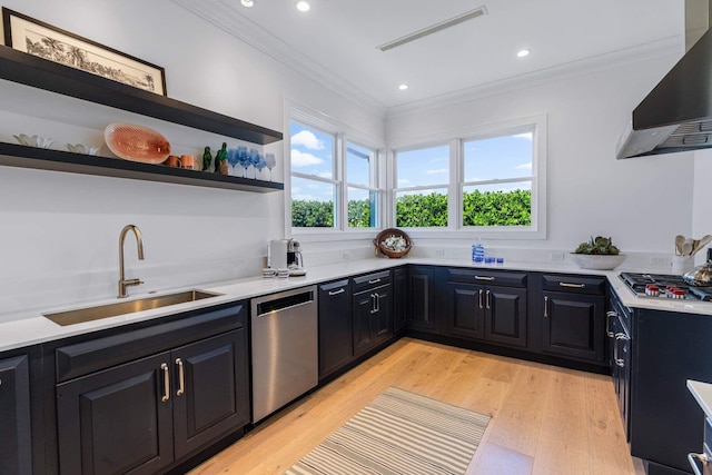 kitchen with wall chimney exhaust hood, open shelves, light countertops, and stainless steel appliances