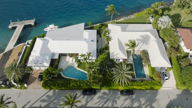 birds eye view of property featuring a water view