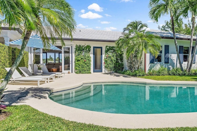 outdoor pool with a patio