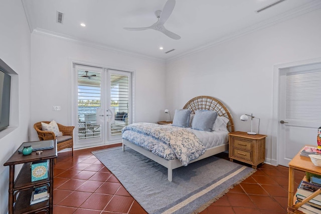 bedroom featuring access to exterior, dark tile patterned floors, crown molding, and french doors