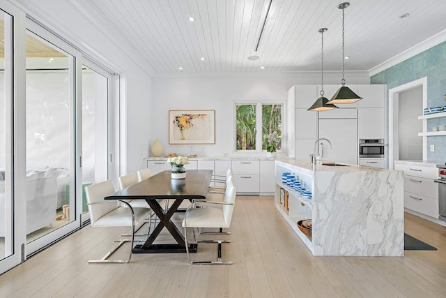 dining space with wood ceiling, light wood-style flooring, crown molding, and recessed lighting