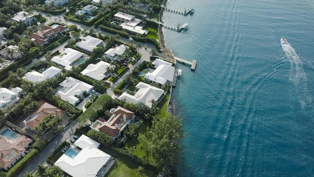 bird's eye view with a residential view and a water view