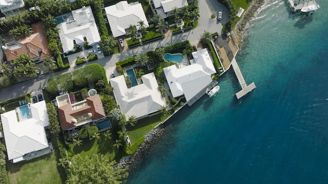 bird's eye view with a residential view and a water view