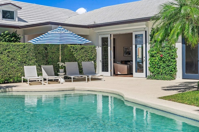 outdoor pool with a patio