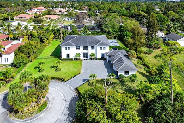 birds eye view of property with a residential view