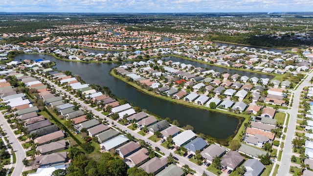 aerial view with a water view and a residential view