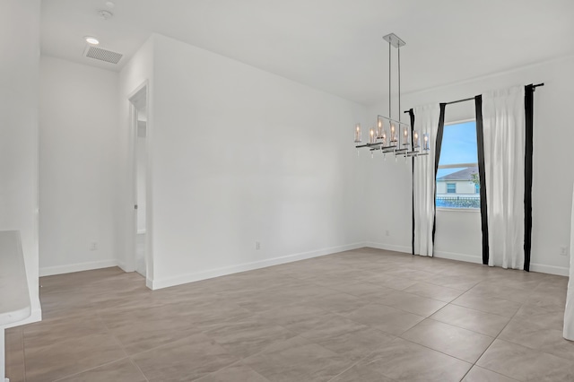 unfurnished dining area with baseboards, light tile patterned floors, visible vents, and a notable chandelier