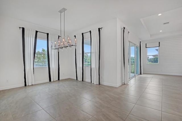 unfurnished room featuring visible vents, baseboards, an inviting chandelier, light tile patterned flooring, and recessed lighting