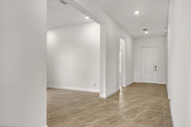 entrance foyer with recessed lighting, visible vents, and baseboards