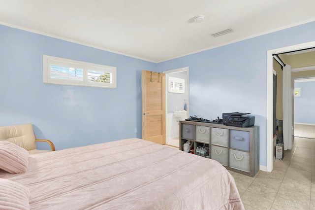 bedroom with visible vents, ornamental molding, and baseboards