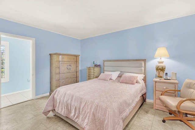 bedroom featuring baseboards