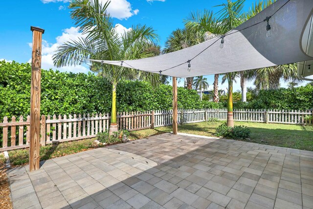 view of patio with fence