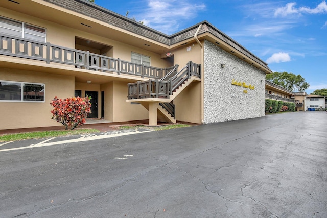 5900 NW 17th Pl Unit 214, Sunrise, FL 33313 - view of building exterior featuring stairs
