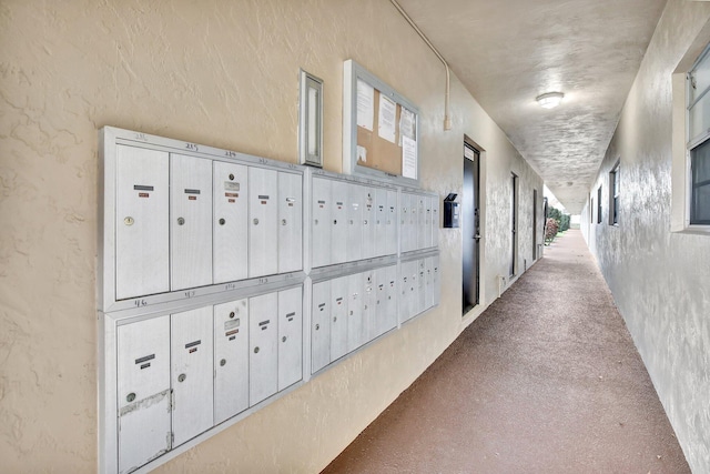 view of property's community featuring mail area