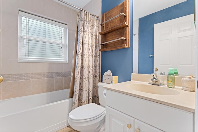 full bath with toilet, shower / tub combo, plenty of natural light, and vanity