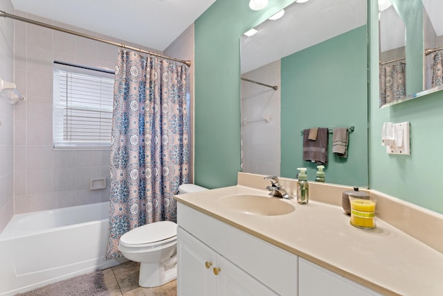 bathroom with shower / tub combo, vanity, toilet, and tile patterned floors