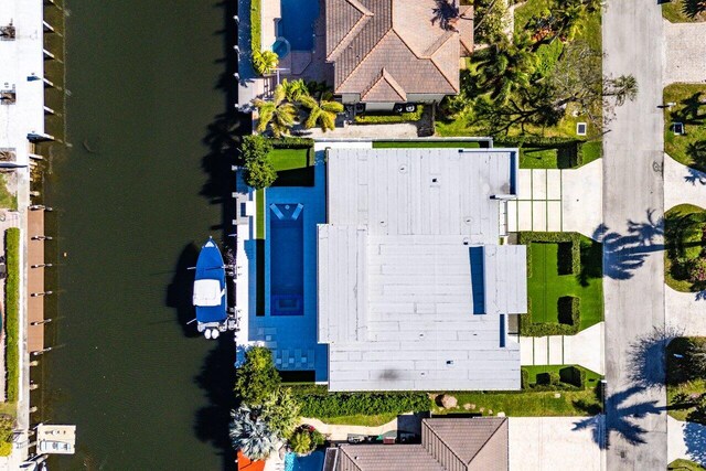 bird's eye view with a residential view and a water view