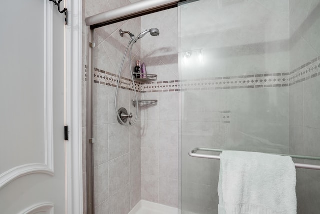 full bathroom with a stall shower