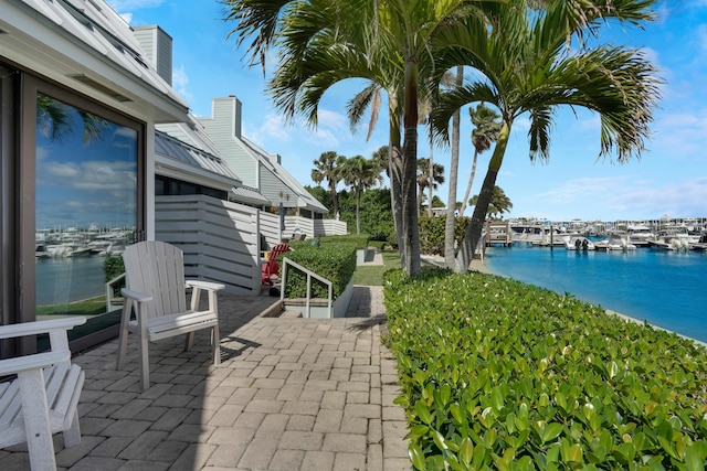 view of patio / terrace featuring a water view