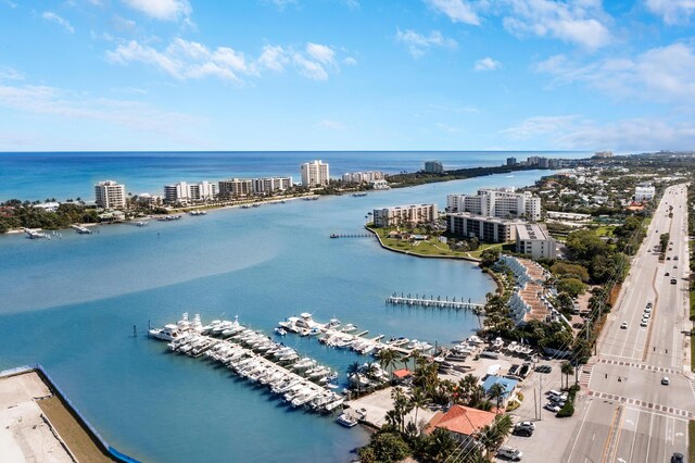 aerial view featuring a water view and a view of city