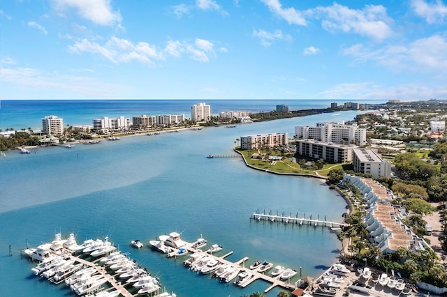 drone / aerial view with a view of city and a water view