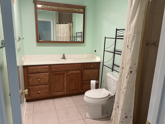 full bath with tile patterned floors, toilet, and vanity