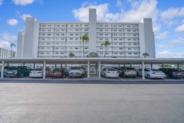 view of property with covered parking