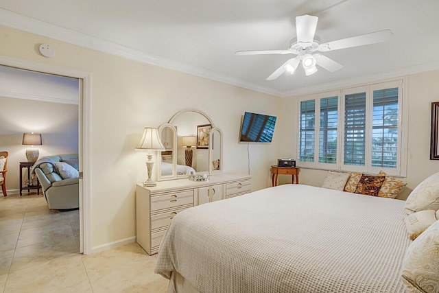 bedroom featuring baseboards, ornamental molding, and a ceiling fan