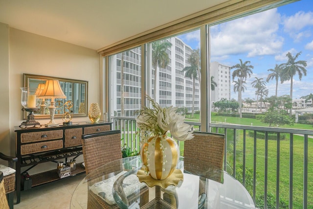 sunroom featuring a view of city