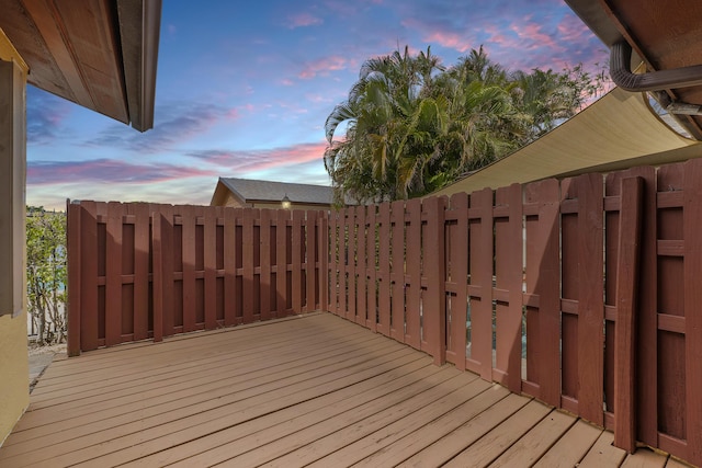 wooden deck featuring fence