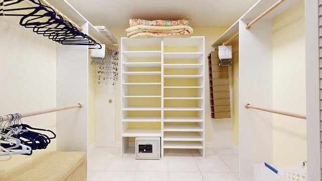 spacious closet featuring tile patterned floors