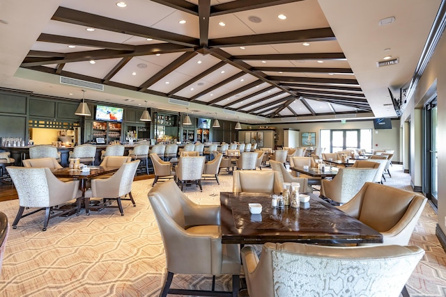 dining area featuring high vaulted ceiling, visible vents, and recessed lighting