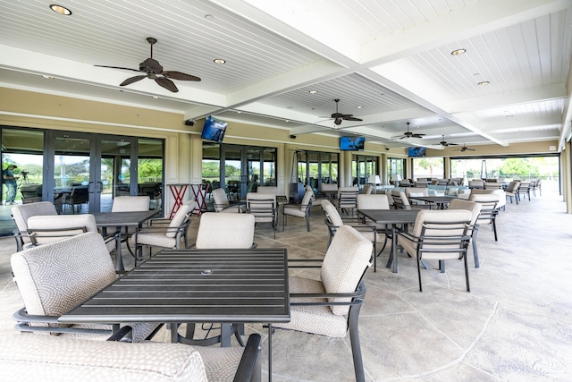 view of patio / terrace with a ceiling fan, outdoor dining space, french doors, and an outdoor living space