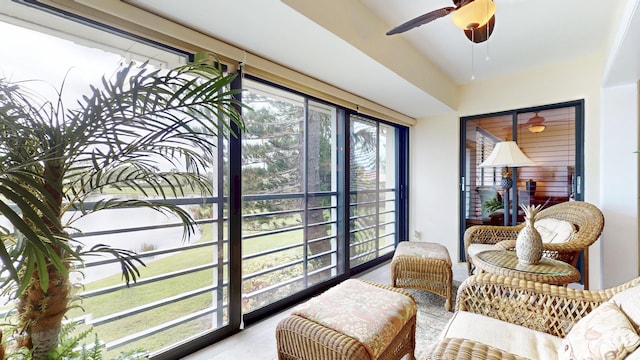 sunroom / solarium with ceiling fan