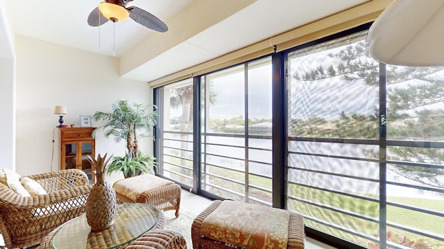 sunroom with ceiling fan