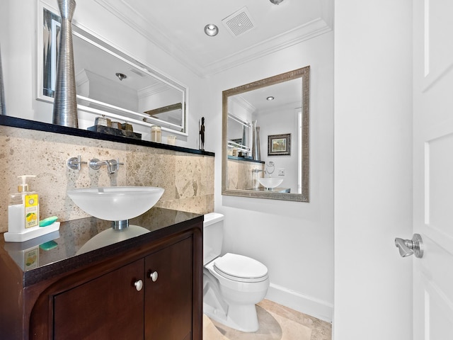 bathroom with visible vents, decorative backsplash, toilet, ornamental molding, and vanity