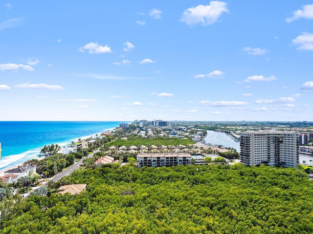 aerial view featuring a view of the beach, a view of city, and a water view