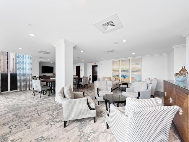 living area with light carpet, visible vents, ornamental molding, ornate columns, and recessed lighting